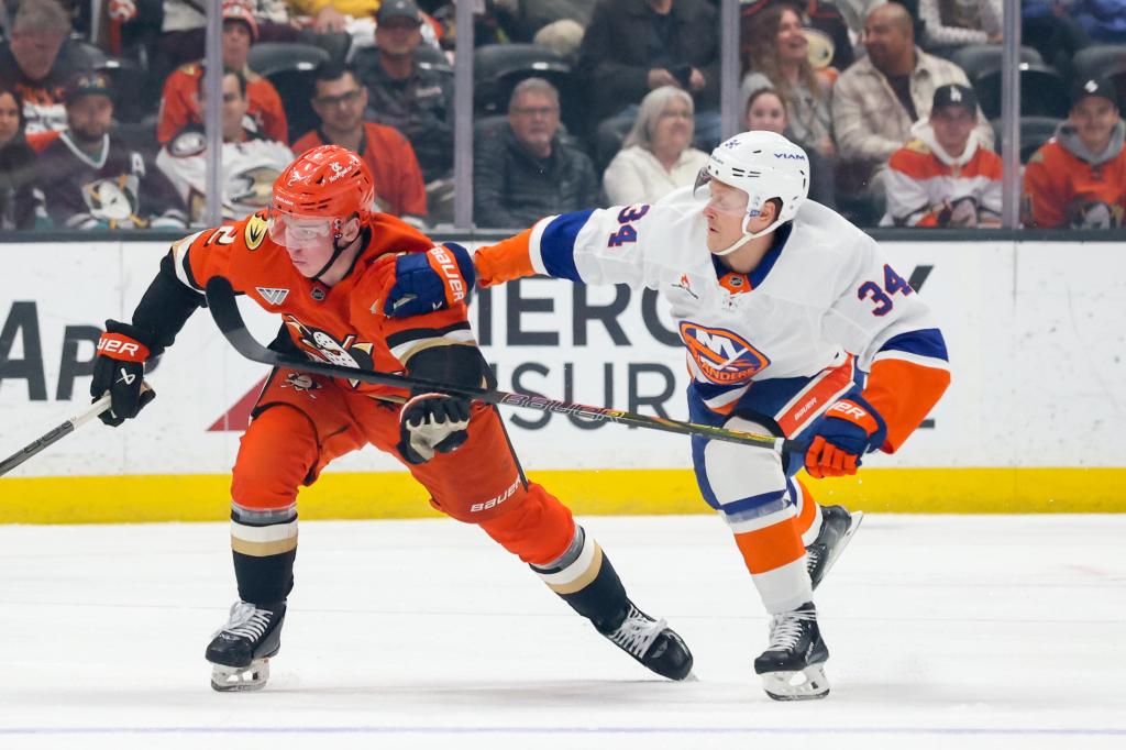 Adam Boqvist skates at center with Islanders in a lineup crunch