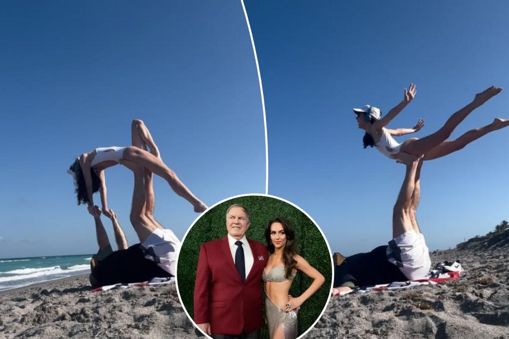 Bill Belichick helps Jordan Hudson perform wild acrobatic pose on beach