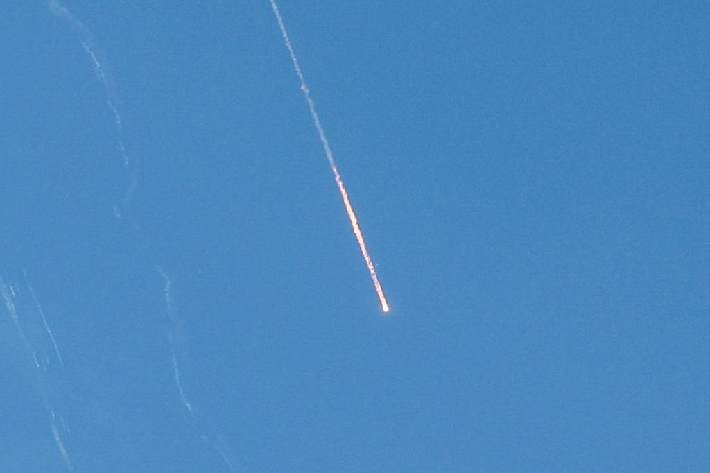 Israel’s military says Iranian missiles incoming, residents urged to seek shelter